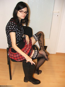 Taking Off Leather Boots And Patterned Nylon Stockings